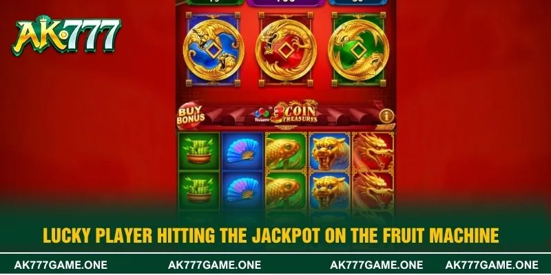 Lucky player hitting the jackpot on the fruit machine